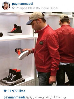 پیمان معادی در یک فروشگاه در دبی مشغول انتخاب یک جفت کفشِ مایکل جوردنی است