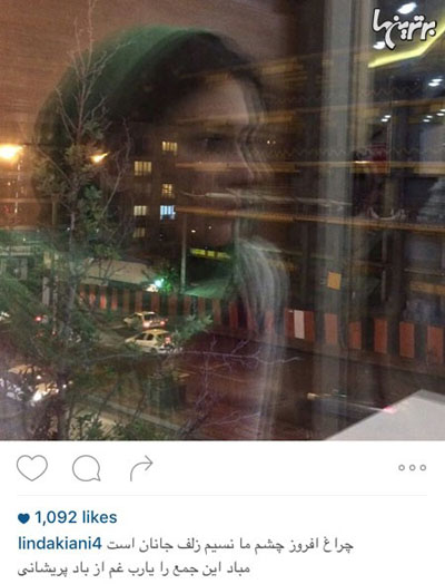 عکس مثلاً هنری لیندا کیانی با بک گراندی از اسکلت یک ساختمان