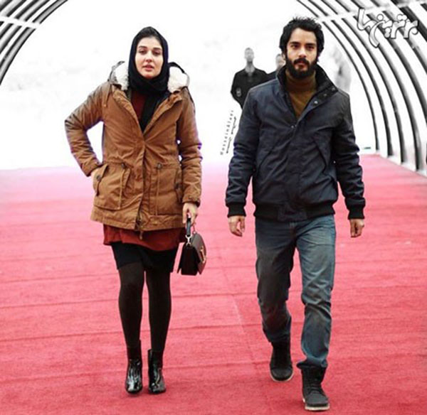 ساعد سهیلی و همسرش گلوریا هاردی در حال ورود به کاخ جشنواره