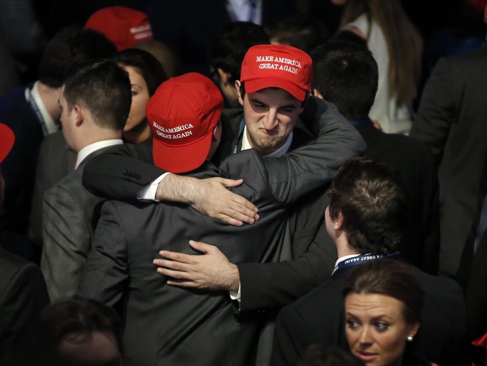 Trump supporters embrace as they watch election returns come in at Republican U.S. presidential nominee Donald Trump's election night rally in New York