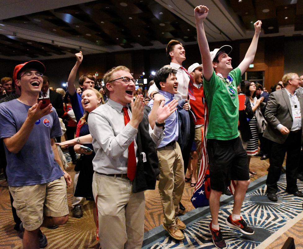 Supporters of U.S. Republican candidate Donald Trump celebrate after the networks called their candidate's victory in the state of North Carolina, at Republican Governor Pat McCrory's election-night party in Raleigh, North Carolina