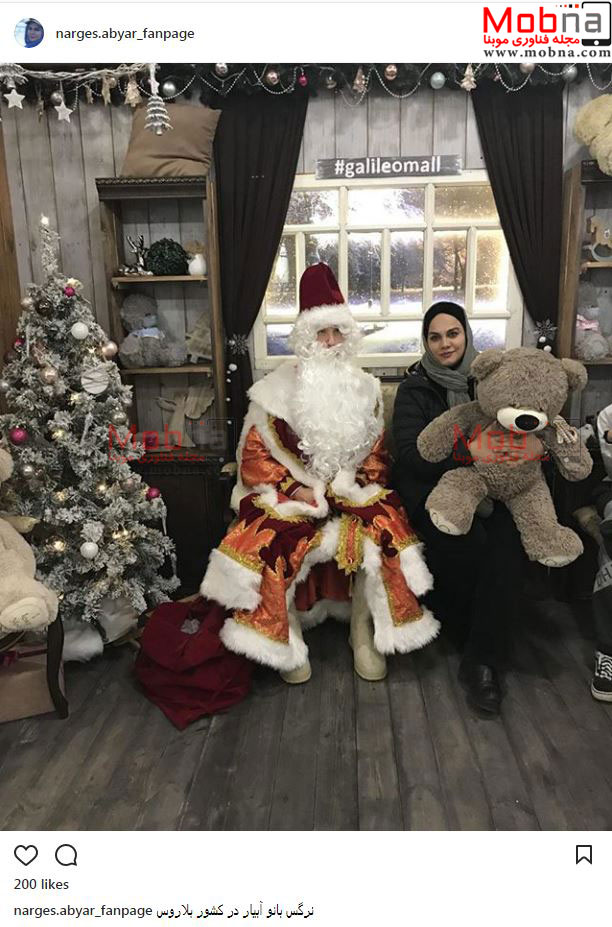 تیپ و ژست جالب نرگس آبیار به همراه بابانوئل در بلاروس (عکس)