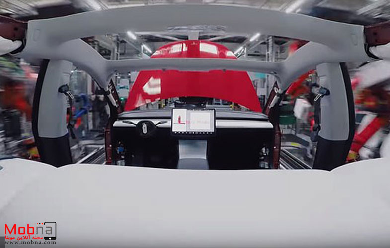 7993142 6542823 The video ends with a completed Model 3 rolling out of the facil a 8 1546282278591